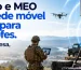 Militar com tablet junto a uma antena da rede móvel do Exército numa colina, com um drone a sobrevoar